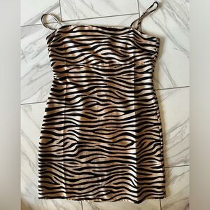 Lulu’s Women’s Black and Gold mini dress. Size M